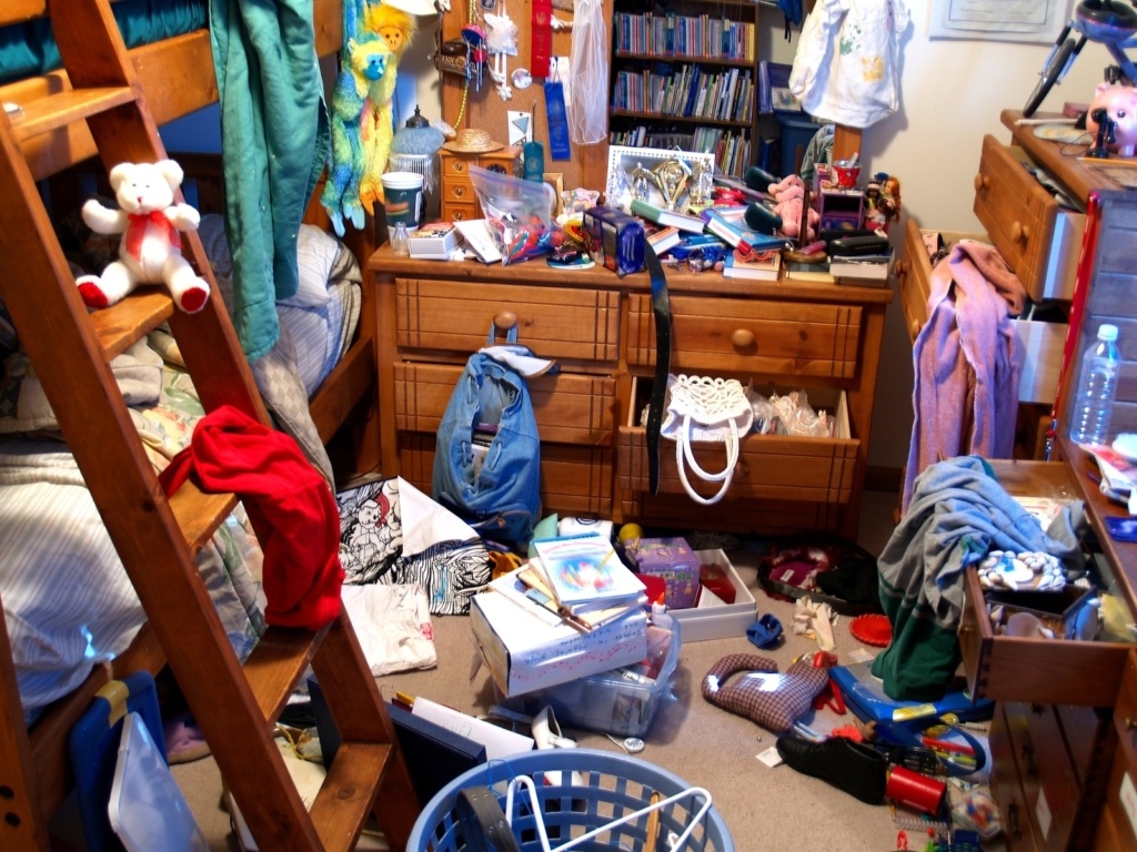 A room is completely messed up and left in chaos. All logos are removed.