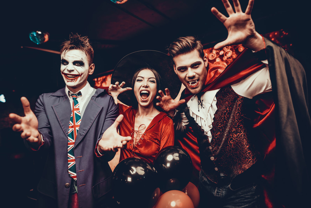 Students or young people in fancy dress at a Halloween party