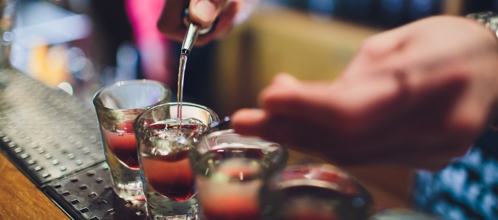 students drinking shots