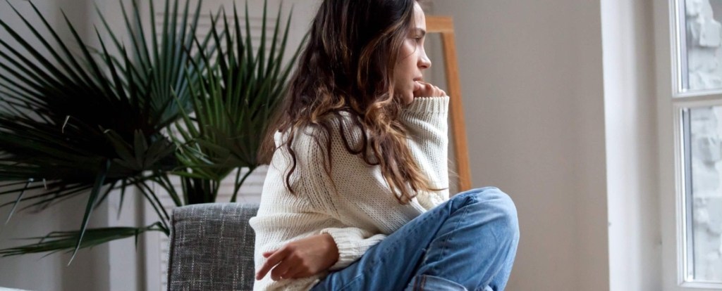 A sad student victim of toxic relationship abuse
