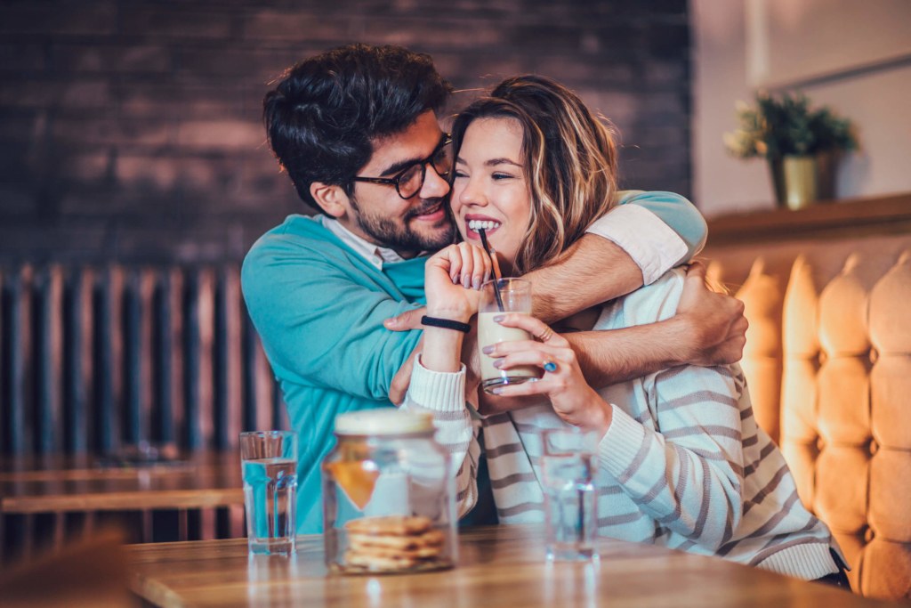 two students hugging in a relationship