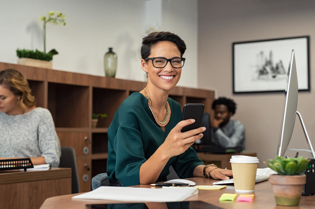 happy female young professional at work