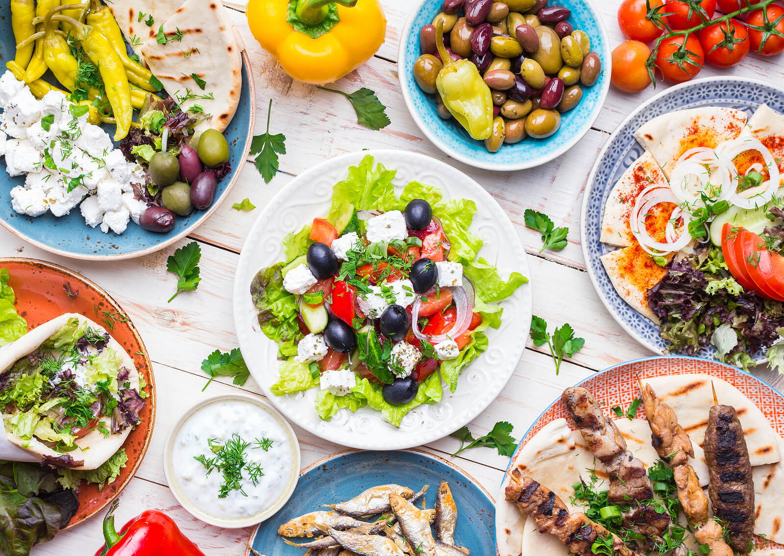 Greek food dishes on a table